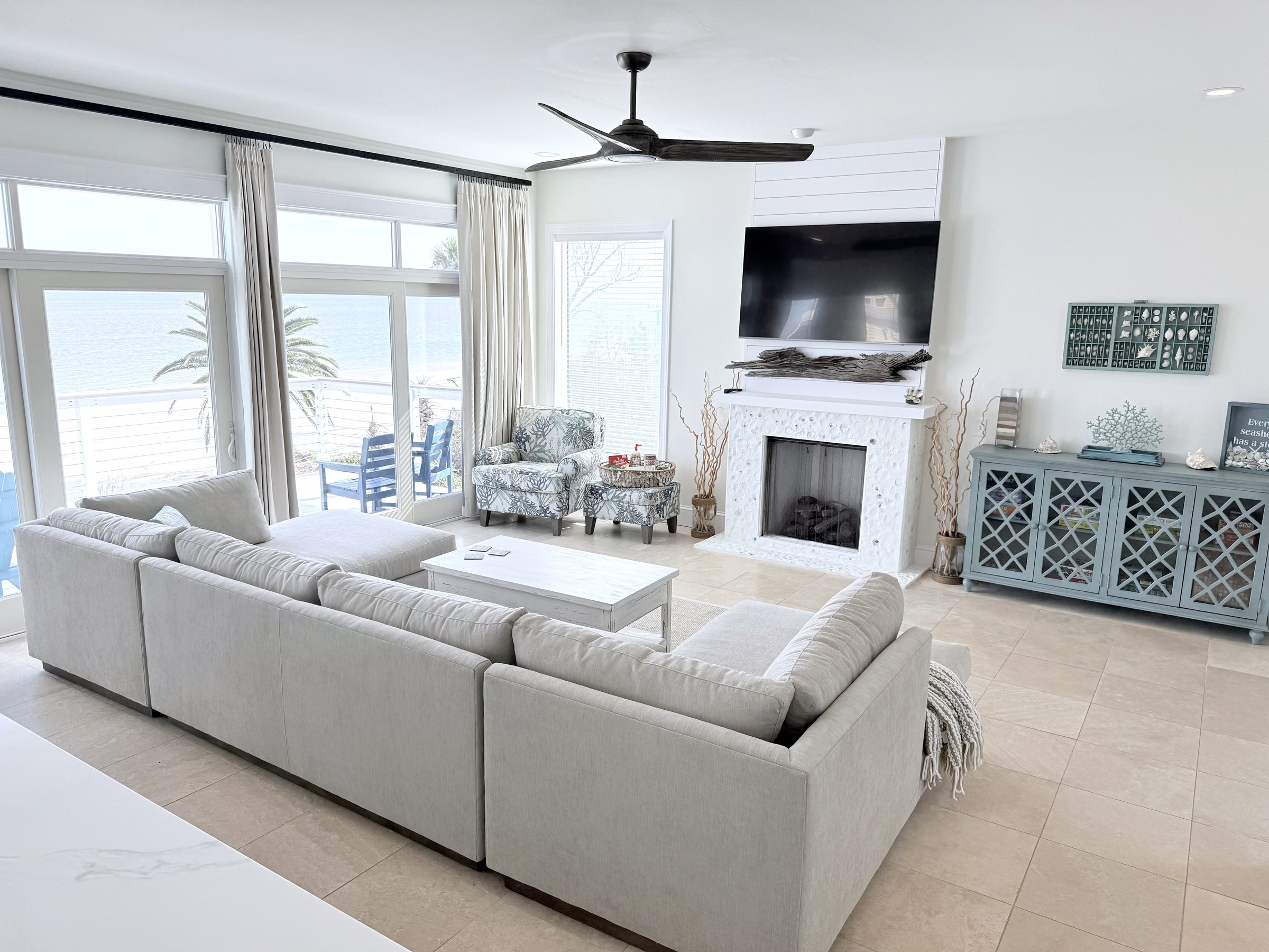 Bright oceanfront living room at Blue Horizon